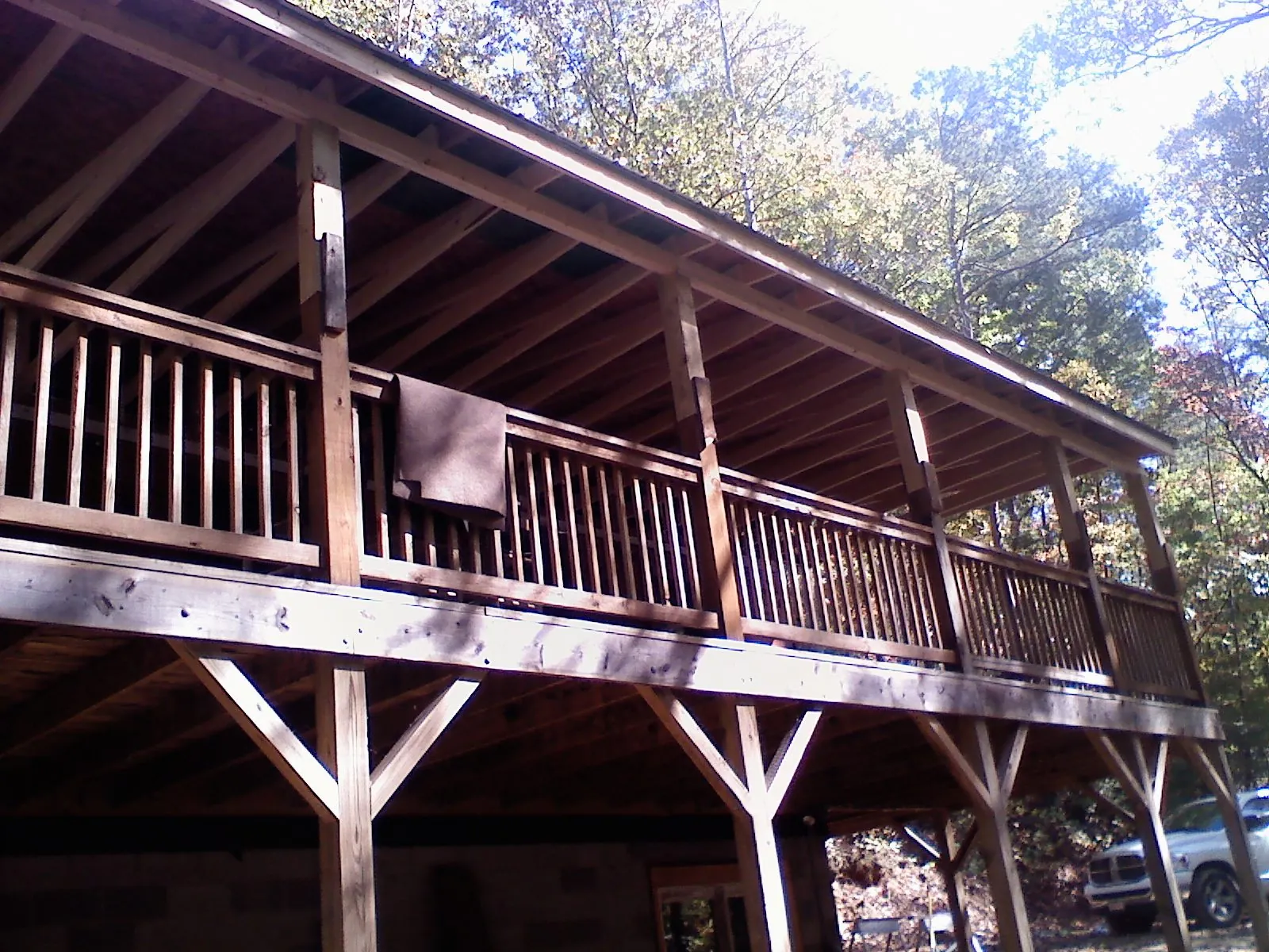 Timber framing under a new elevated porch and deck — Roof Leak Repair in Elm Mott by Roofing Brothers